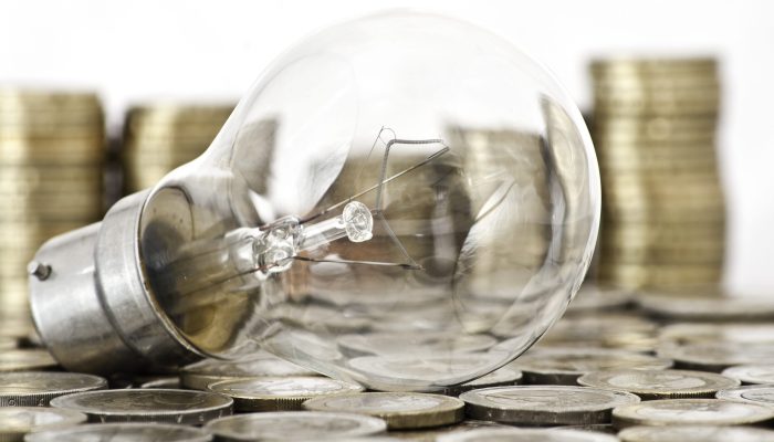 filament-bulb-lying-euro-coins.jpg